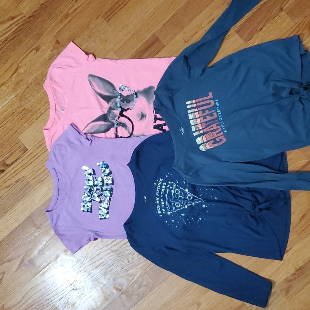 Lot of 4 used Justice shirts girls size 8 multi colors